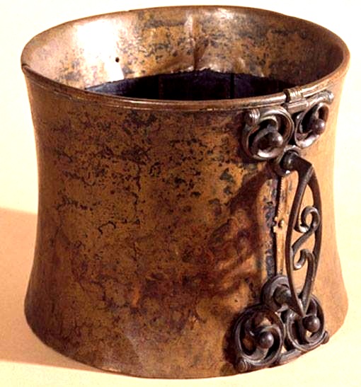 a - a - a - Trawsfynydd, Gwynedd bog tankard - of bronze and (wood) yew - Cast Bronze handle - S shaped triskele motifs - ca. 50 BC